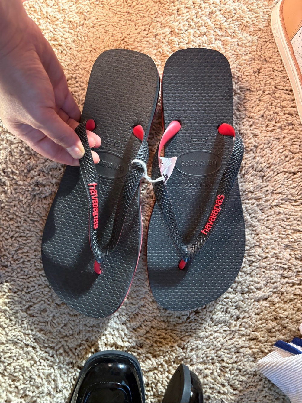Havaianas Black Flip Flops with Red Accents